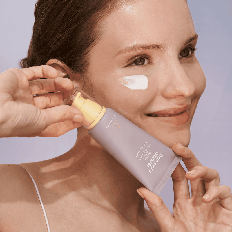 HARUHARU WONDER Black Rice Pure Mineral Relief Daily Sunscreen Application on the skin